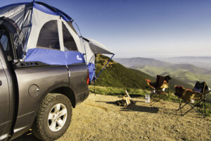 Leave no Trace camping in the wilderness - a truck tent overlooks a canyon